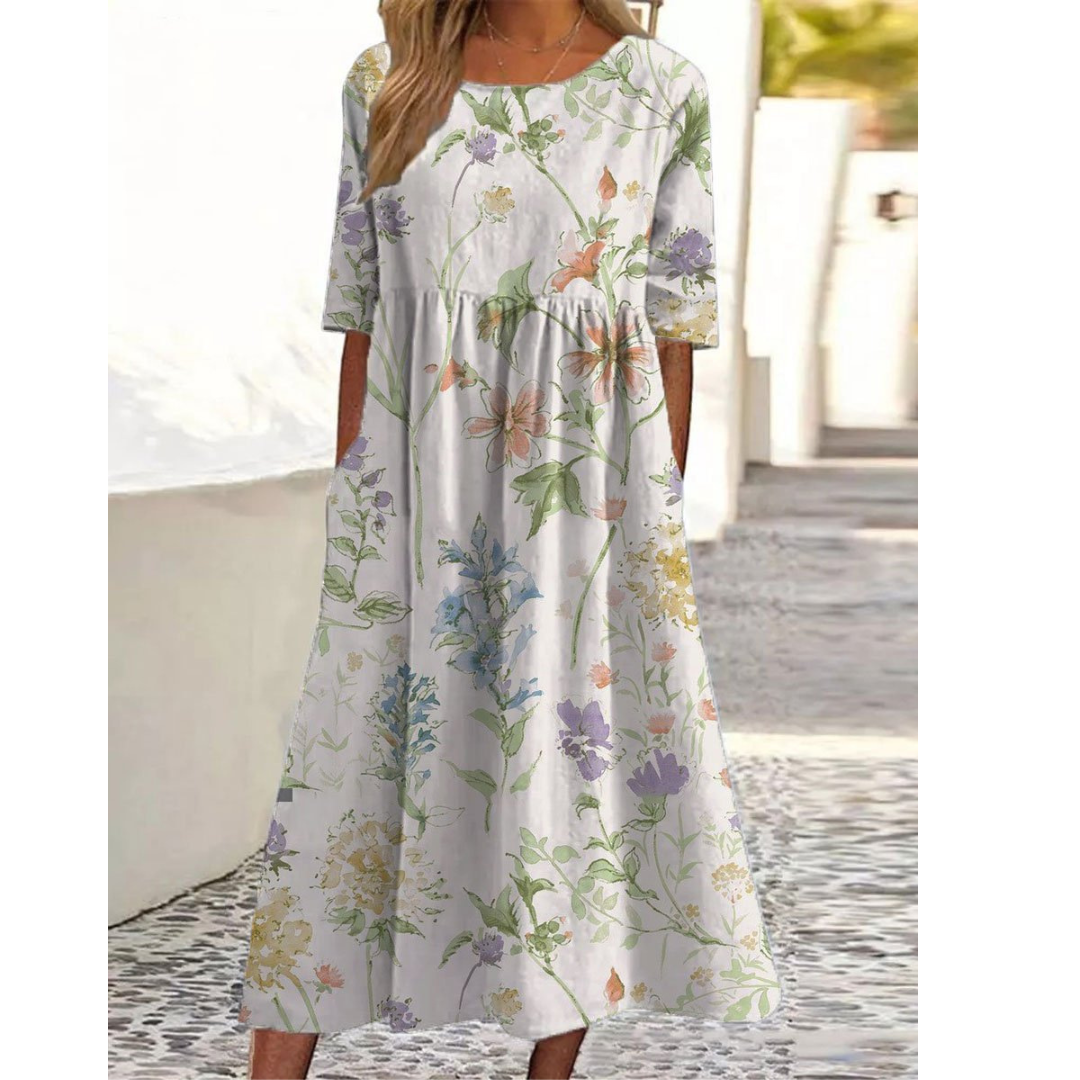 Chic kortärmad midiklänning med tryckt växtmönster