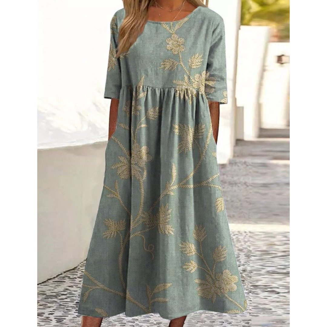 Chic kortärmad midiklänning med tryckt växtmönster