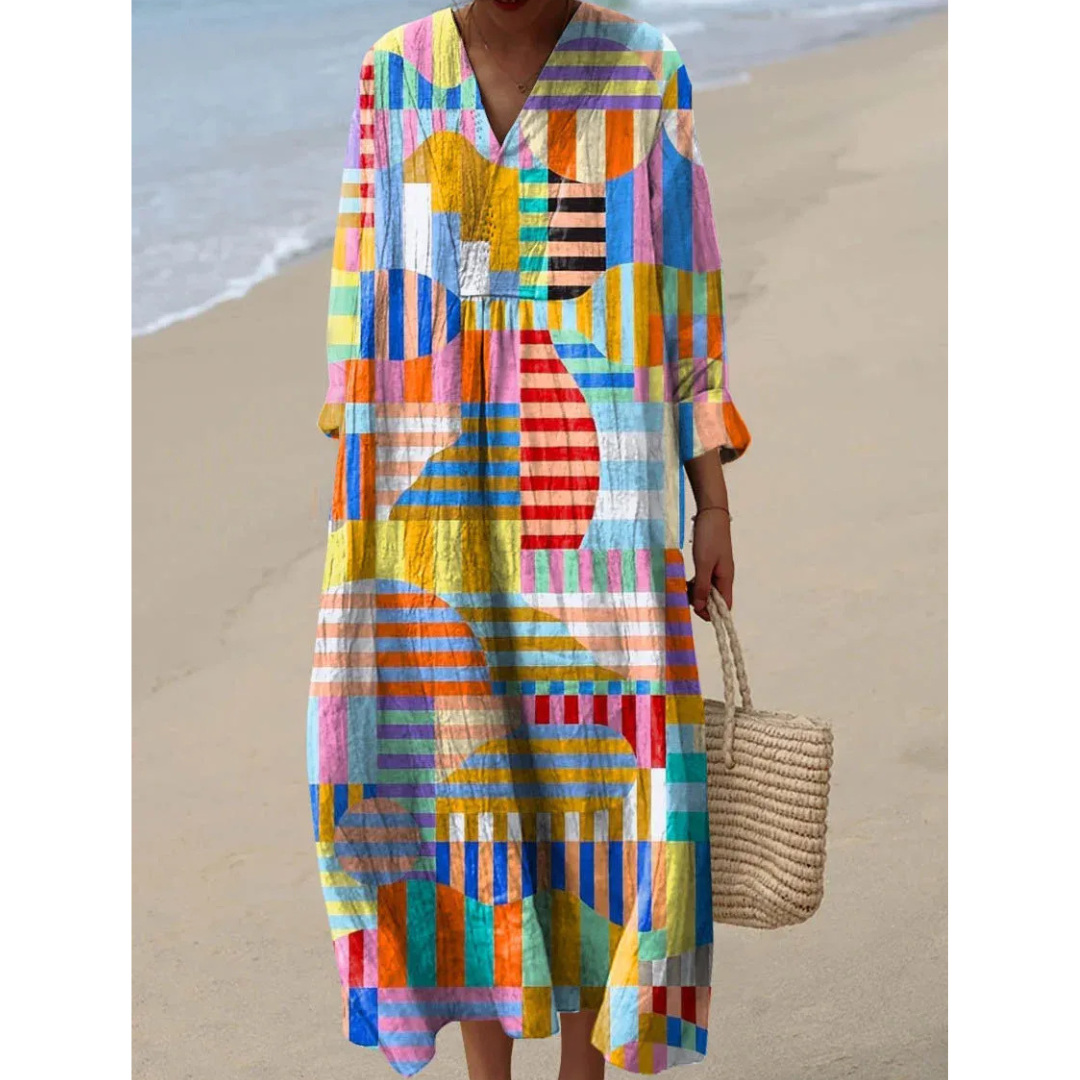 Maxiklänning med konstnärligt tryck – Stilren och färgstark