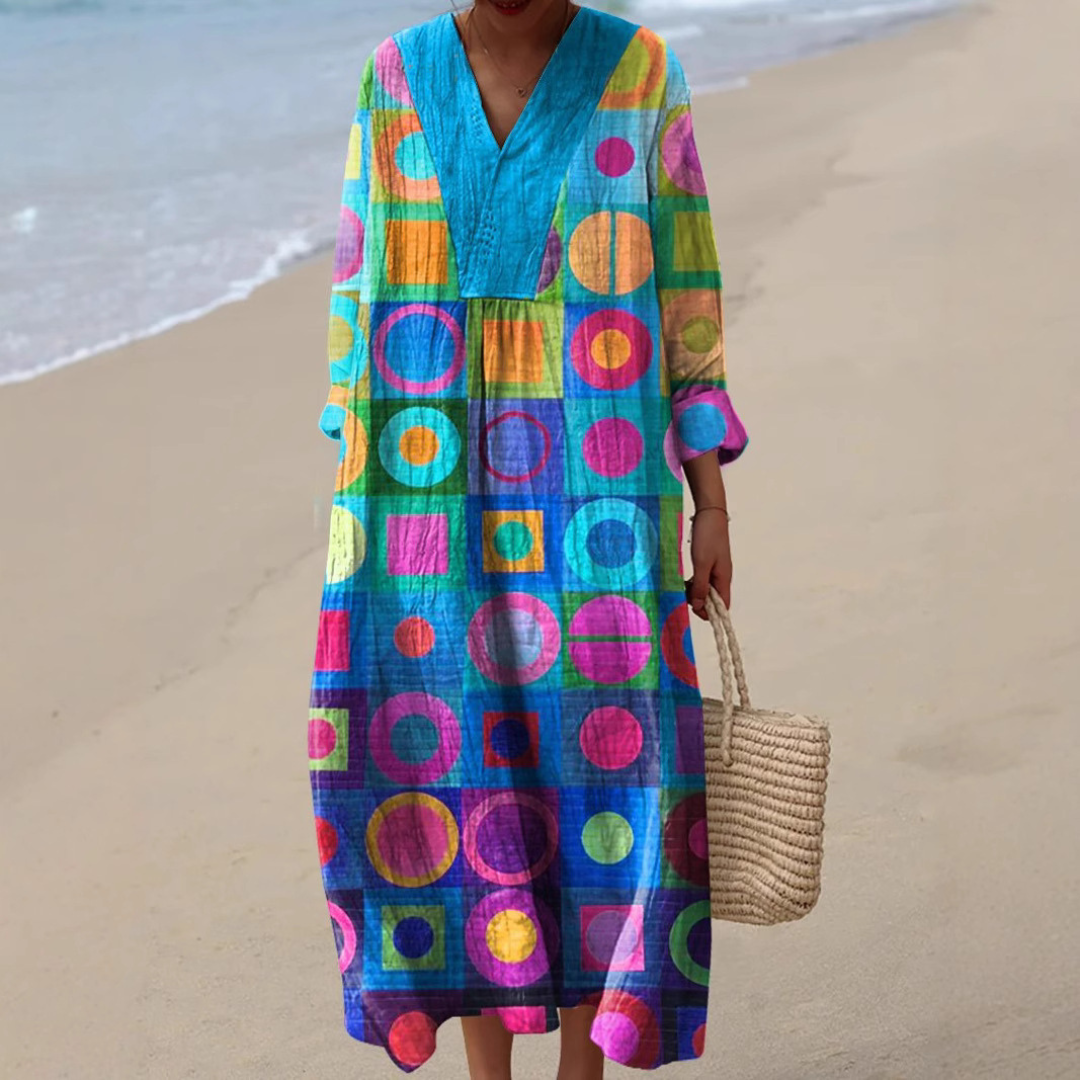 Maxiklänning med konstnärligt tryck – Stilren och färgstark