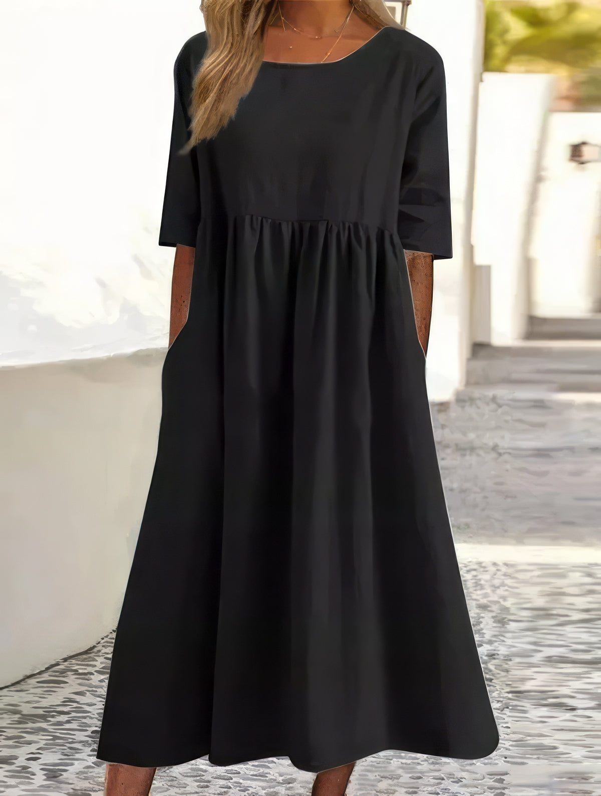 Cotton dress with round neck and pockets