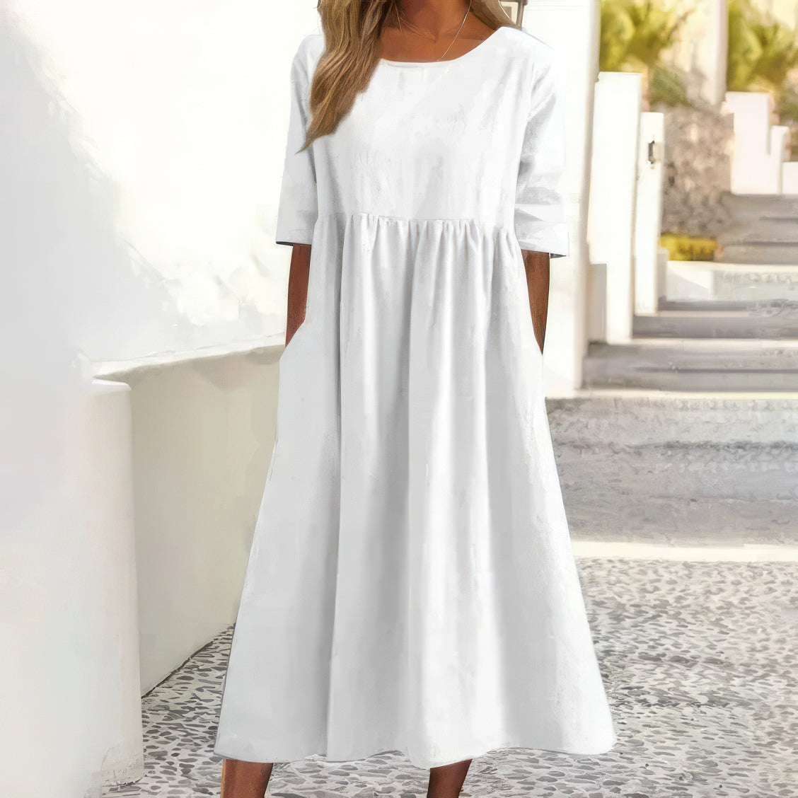 Cotton dress with round neck and pockets